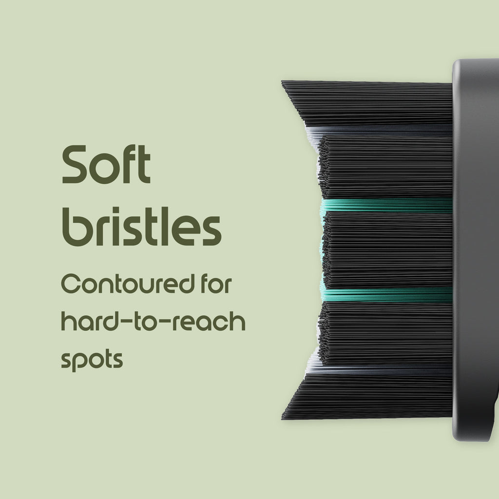 Bristle brush with soft bristles on a light green background
