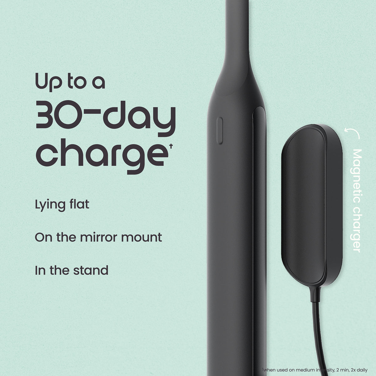 Black electronic device with magnetic charger on a light blue background, featuring text about charging capabilities.