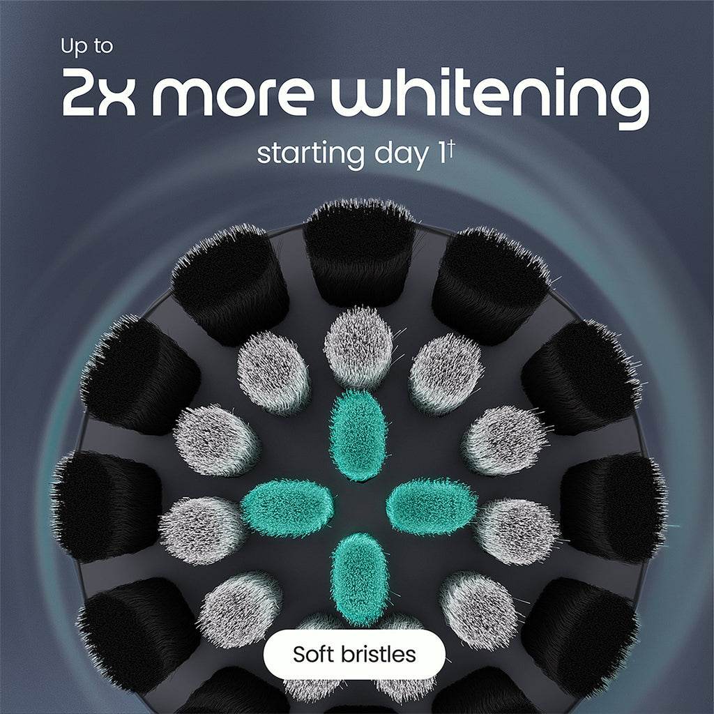 Electric toothbrush head with soft bristles on a dark background