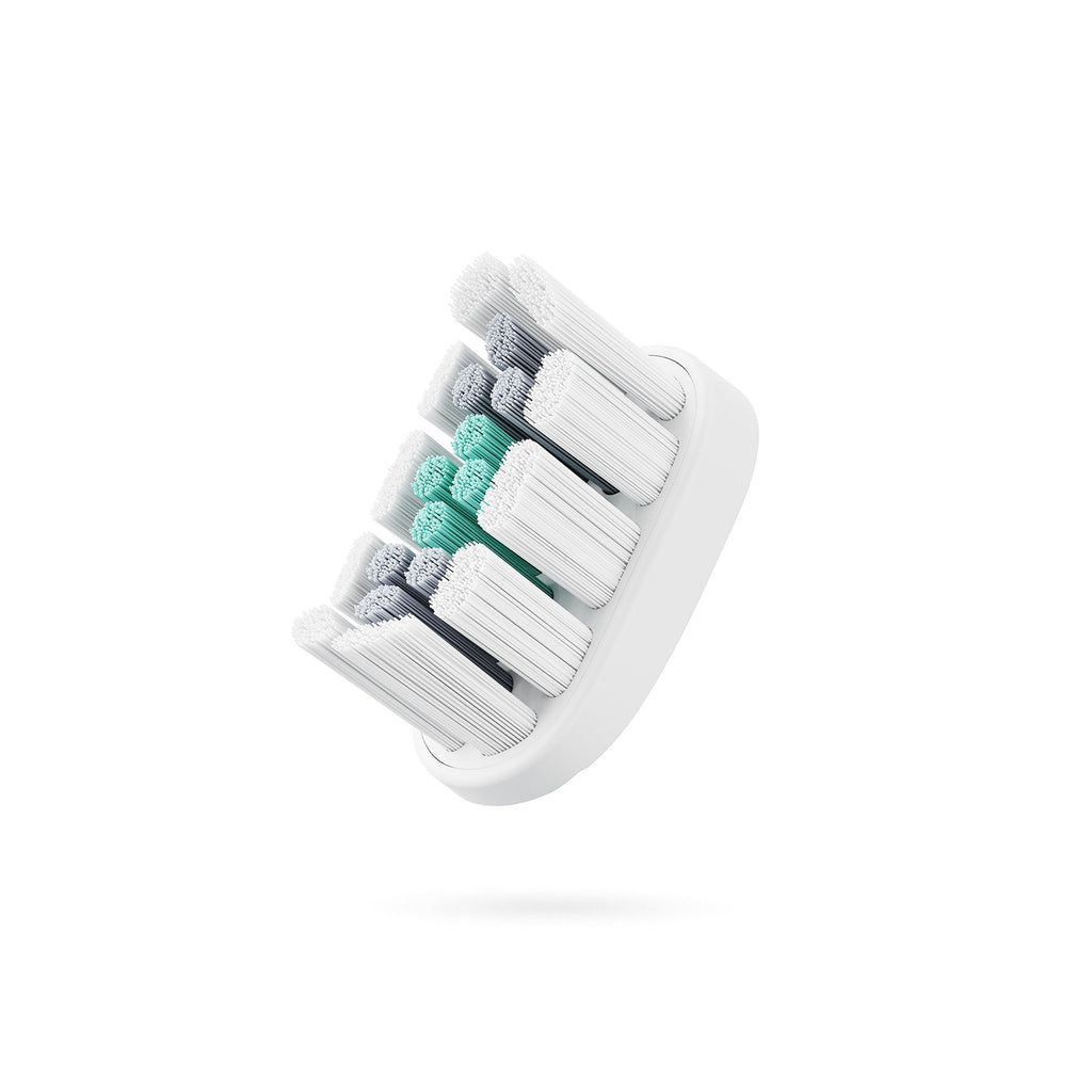 A white Ultra EasyClick Brush Pod Refill Head with soft bristles, designed for use with Quip toothbrushes.