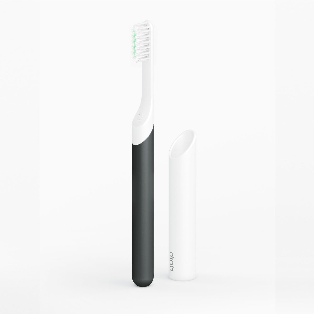 Black and white electric toothbrushes on a white background